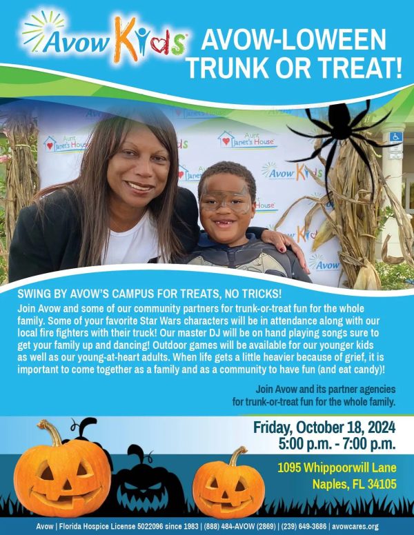 Woman and child at Halloween trunk-or-treat